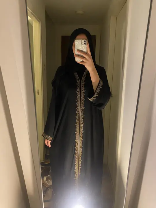 black abaya with gold embroidery